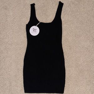 Gorgeous ribbed black mini dress from princess Polly! Dress it up or down!